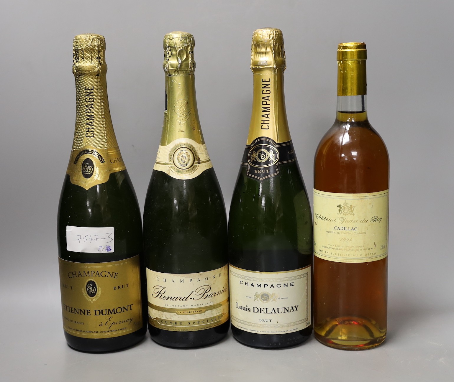 Two bottles of Etienne Dumont NV Champagne, two bottle of Louis Delauney NV Champagne, one bottle of Pol Roger NV Champagne, one bottle of Renard Barnier and a bottle of Chateau Jean Du Roy Cadillac , 1994. (7)